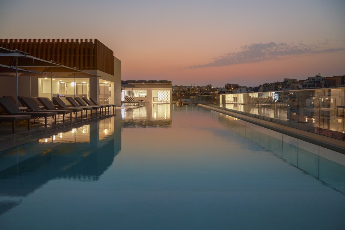 Infinity pool edge at golden hour